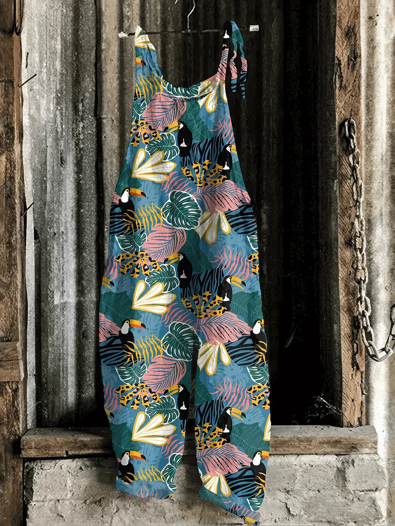 Solea | Lightweight artisanal jumpsuit in tropical jungle print with toucans & wildcats