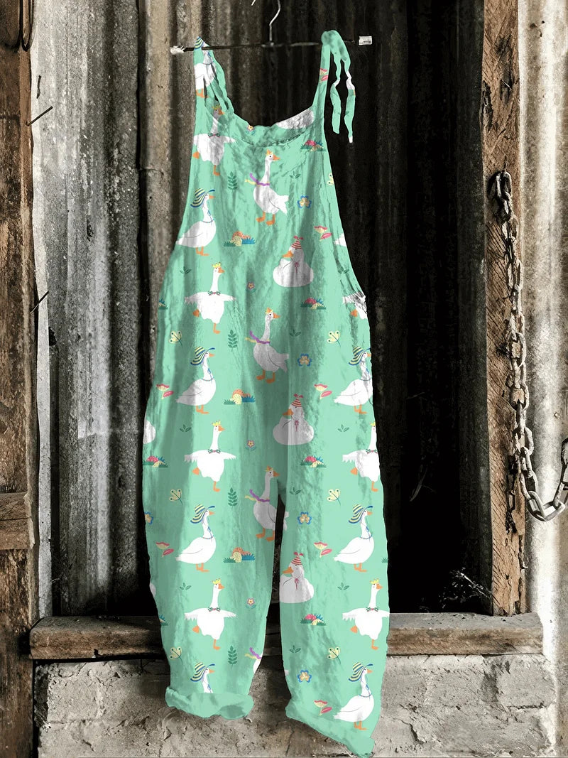 Solea | Lightweight artisanal jumpsuit in mint green with whimsical goose & meadow print
