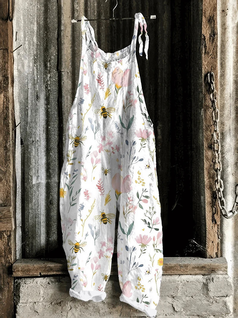 Solea | Lightweight artisanal jumpsuit in white bee & wildflower meadow print